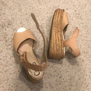Flatform nude sandals.